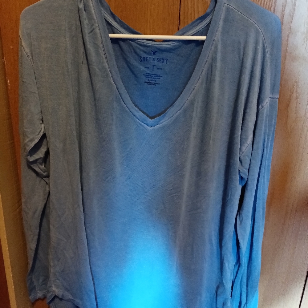 Long sleeve blue shirt. Soft and sexy brand.